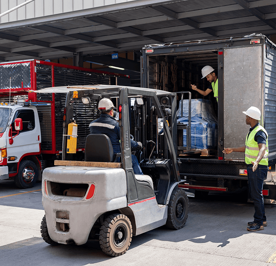Image 8 - Forklift loading truck with man inside 1 (1)